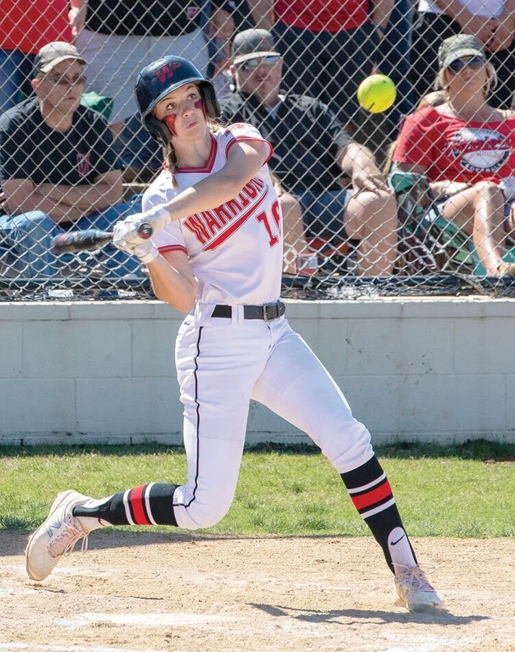 Washington sophomore Tinley Lucas gets a bead on a ball at the State softball tournament last Wednesday. Washington fell to Silo 17-13 in the semifinal game.