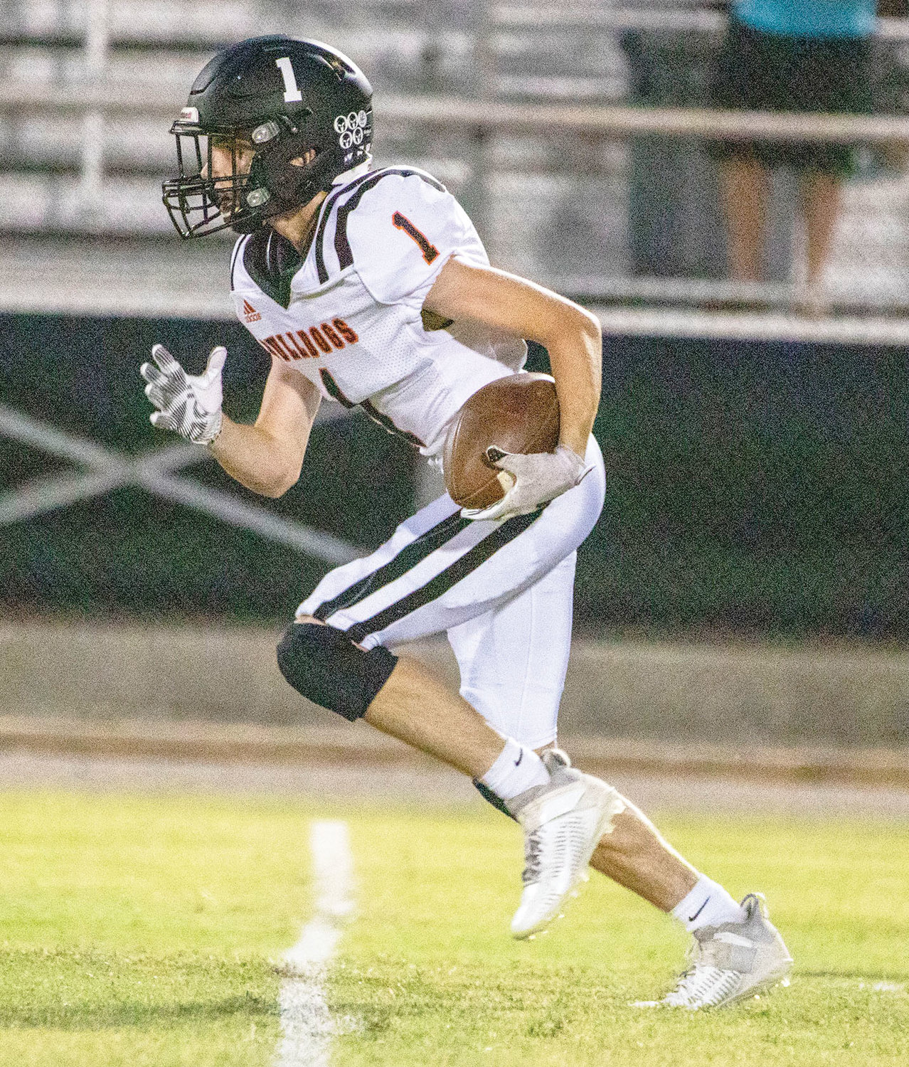 Wayne junior Kaleb Madden runs with the football Friday night during Wayne’s 46-6 win over Lexington. Madden had two carries for 32 yards, as well as two receptions.
