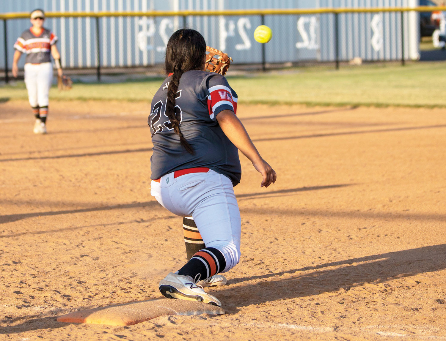 Wayne senior Mayce Trejo catches a ball at first base for an out. Wayne hosted the District tournament Wednesday.