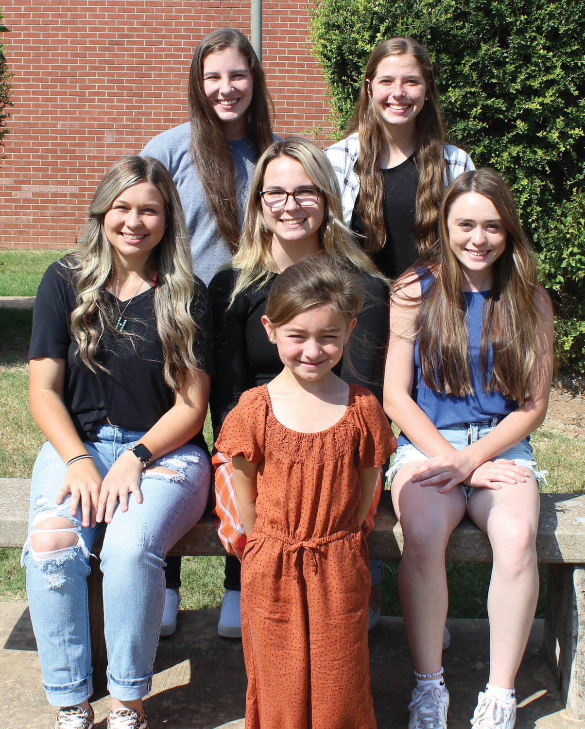 Wayne High School will name its queen before Friday’s homecoming game against the Wynnewood Savages. The queen candidates are, seated from left, Haiden Parker, Hannah VanSchuyver and Mckenzie Fisher. Attendants are, standing from left, Kaylee Madden and Haylee Durrence. Center front is the flower girl, Addison Martin.