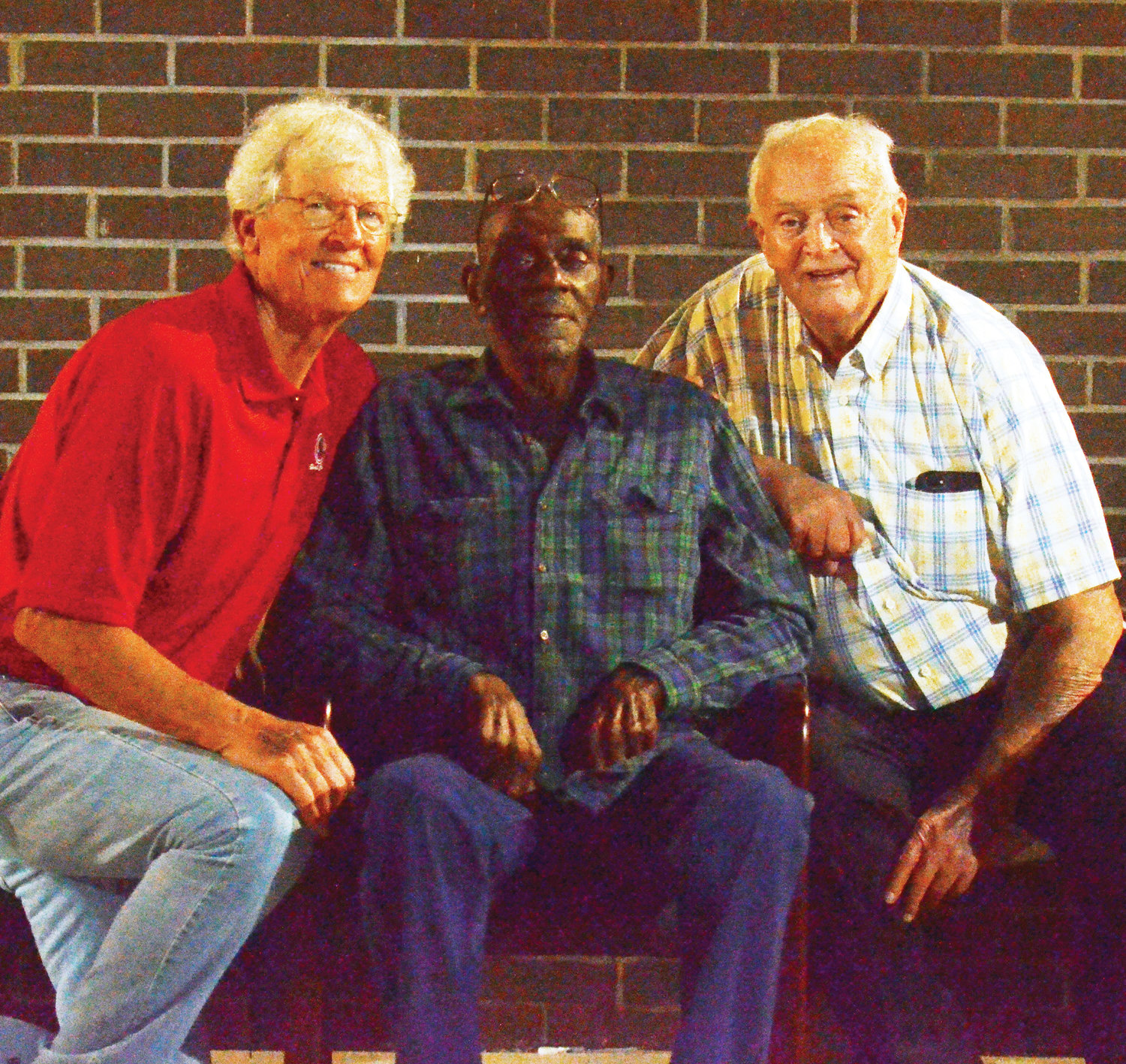 Graduates from the Purcell High School class of 1961, from left, Dr. Rick McCurdy, Herman Cheadle and Don Boyer visited at Conger Field Friday night among homecoming festivities and Cheadle’s induction into the Purcell Sports Hall of Fame.
