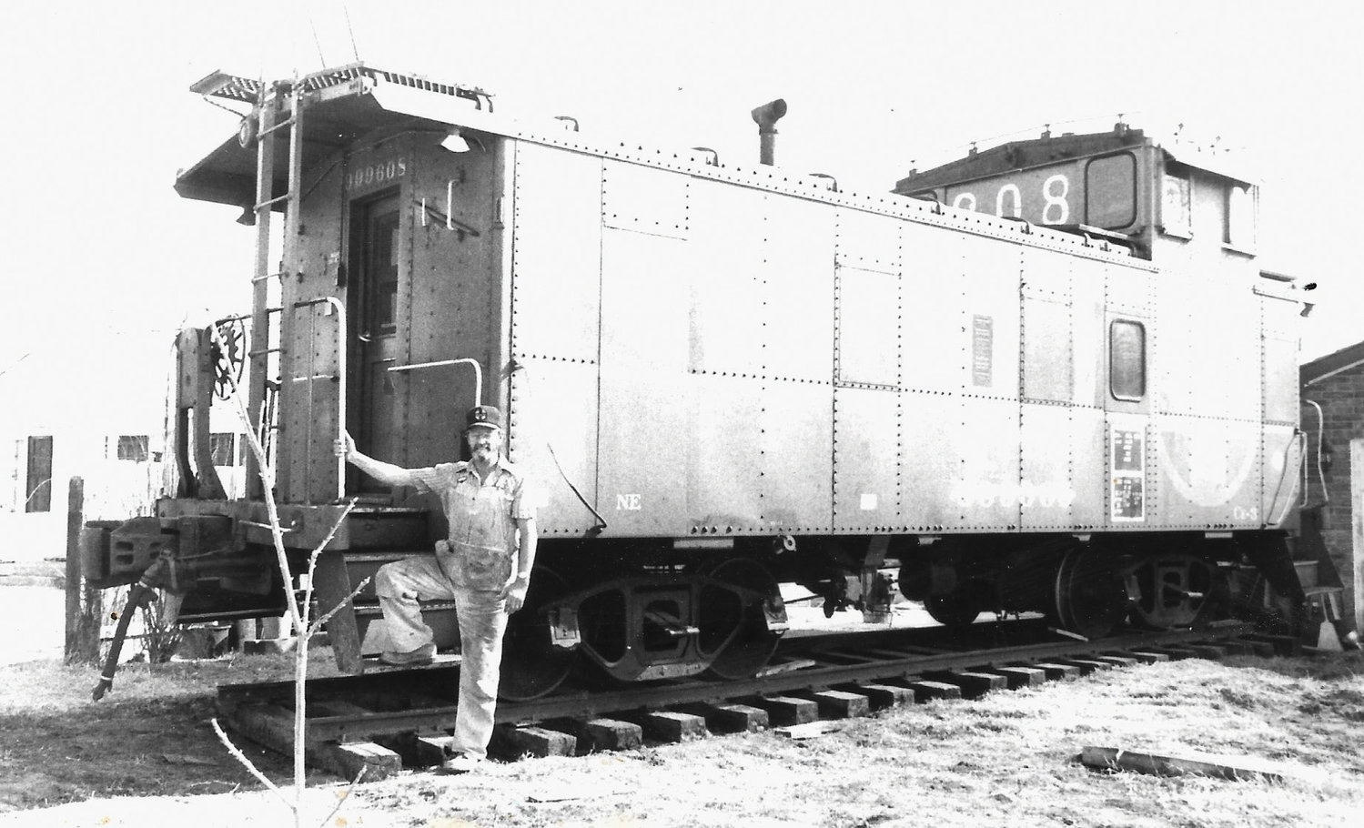 The caboose at 2nd and Main in downtown Purcell was a gift to the city from Sam Harlan, pictured.