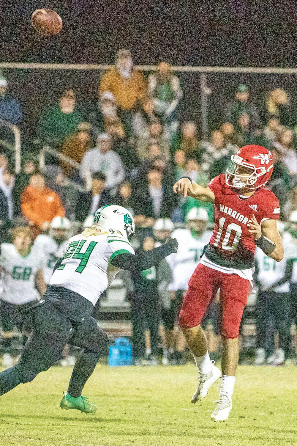 Washington sophomore Major Cantrell throws a ball over the middle during the Warriors’ 52-21 win over Jones Friday night. Washington travels to Owasso to face Rejoice Christian in the quarterfinals of the State playoffs this Friday.