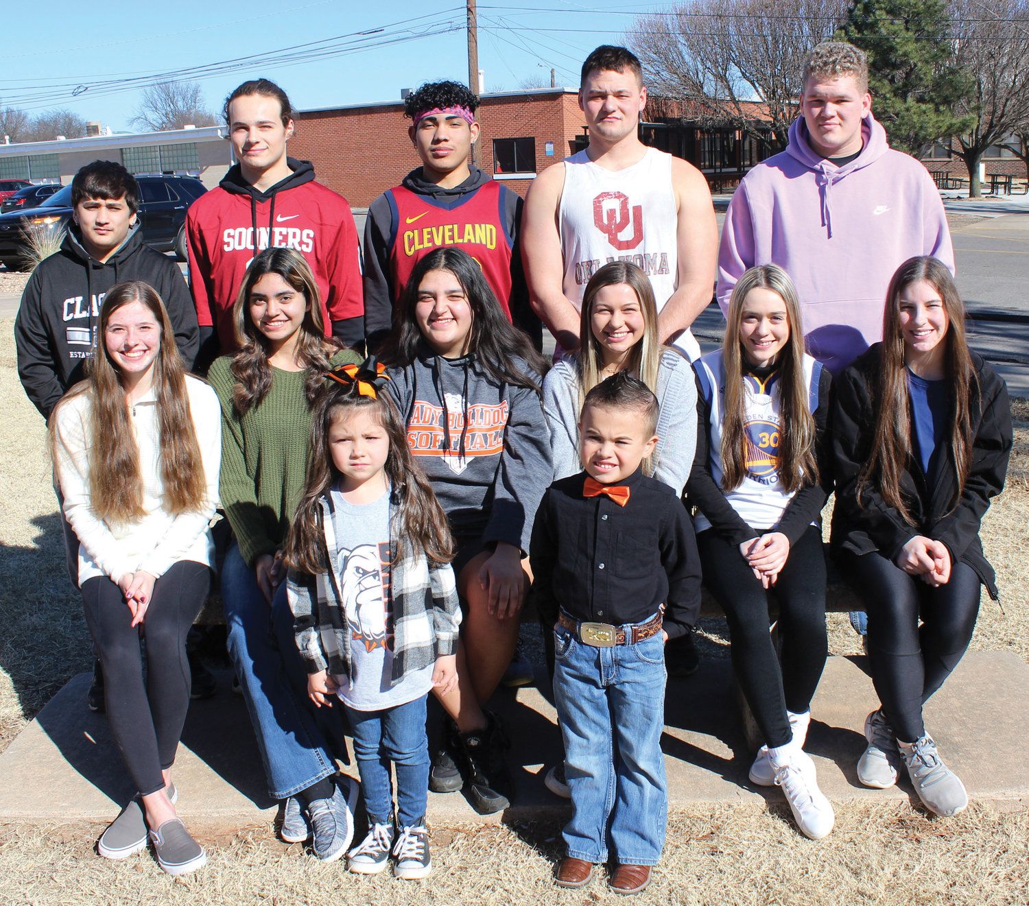 Wayne High School’s basketball homecoming court are, seated from left, Haylee Durrence, Lorensa Martinez, Mayce Trejo, Haiden Parker, McKenzie Fisher and Kaylee Madden. Standing from left are Junior Perez, Ethan Mullins, Dom Sampson, Brannon Lewelling and Andy Lee. In front are Hayslee Smith and Legend Adkins.