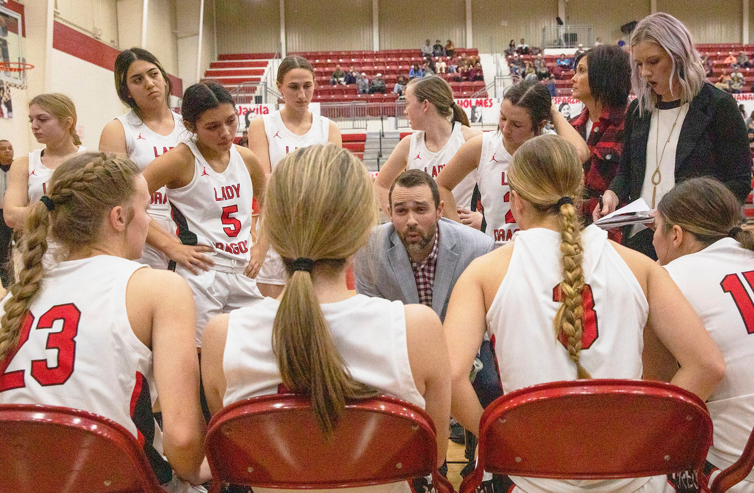 Purcell girls coach David Sikes talks to his team during a timeout. The Dragons host Lexington Friday night at 6 p.m.