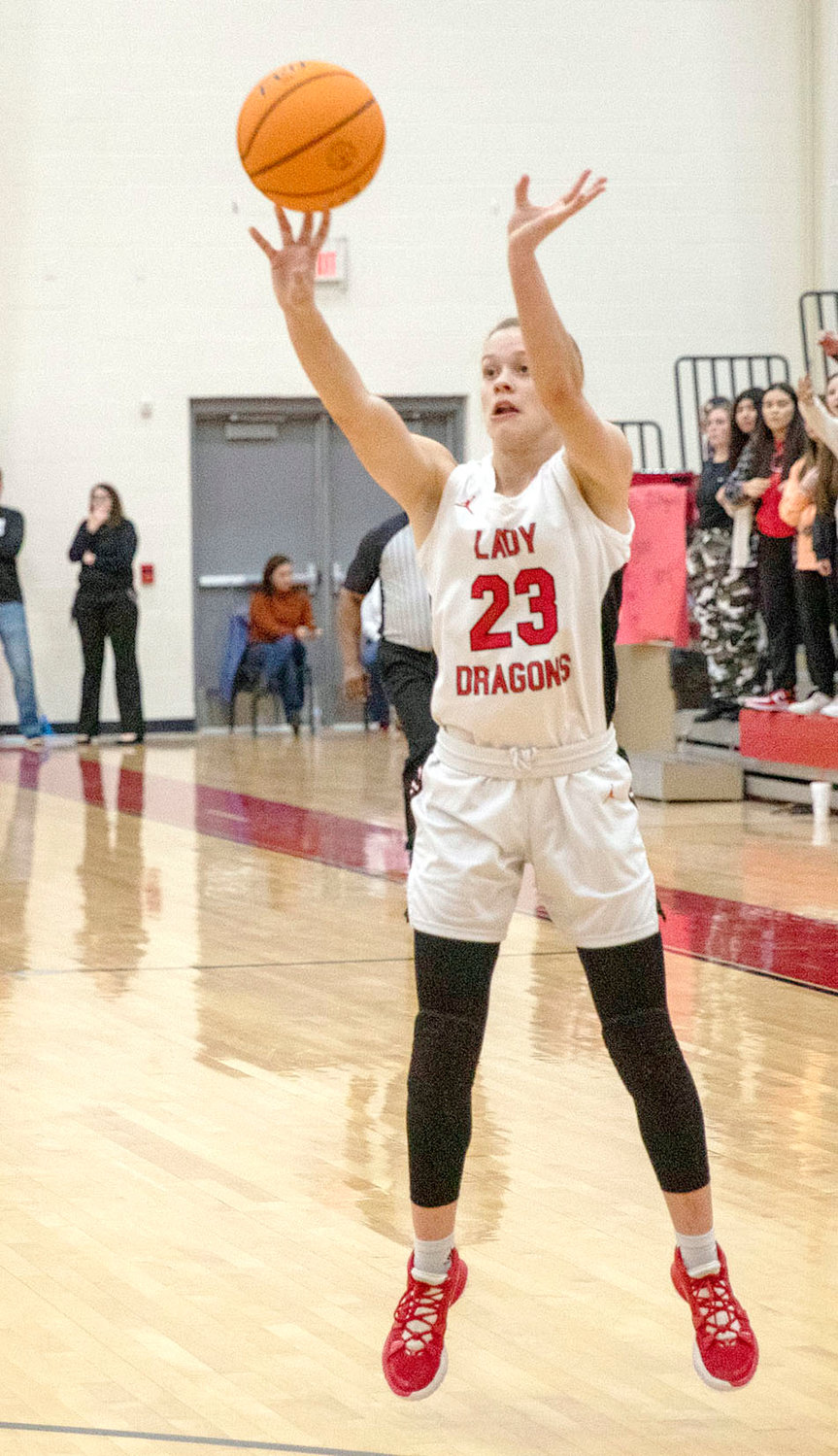 Purcell freshman Hadleigh Harp shoots a three-pointer. Harp and the Dragons travel to Marlow Friday night.