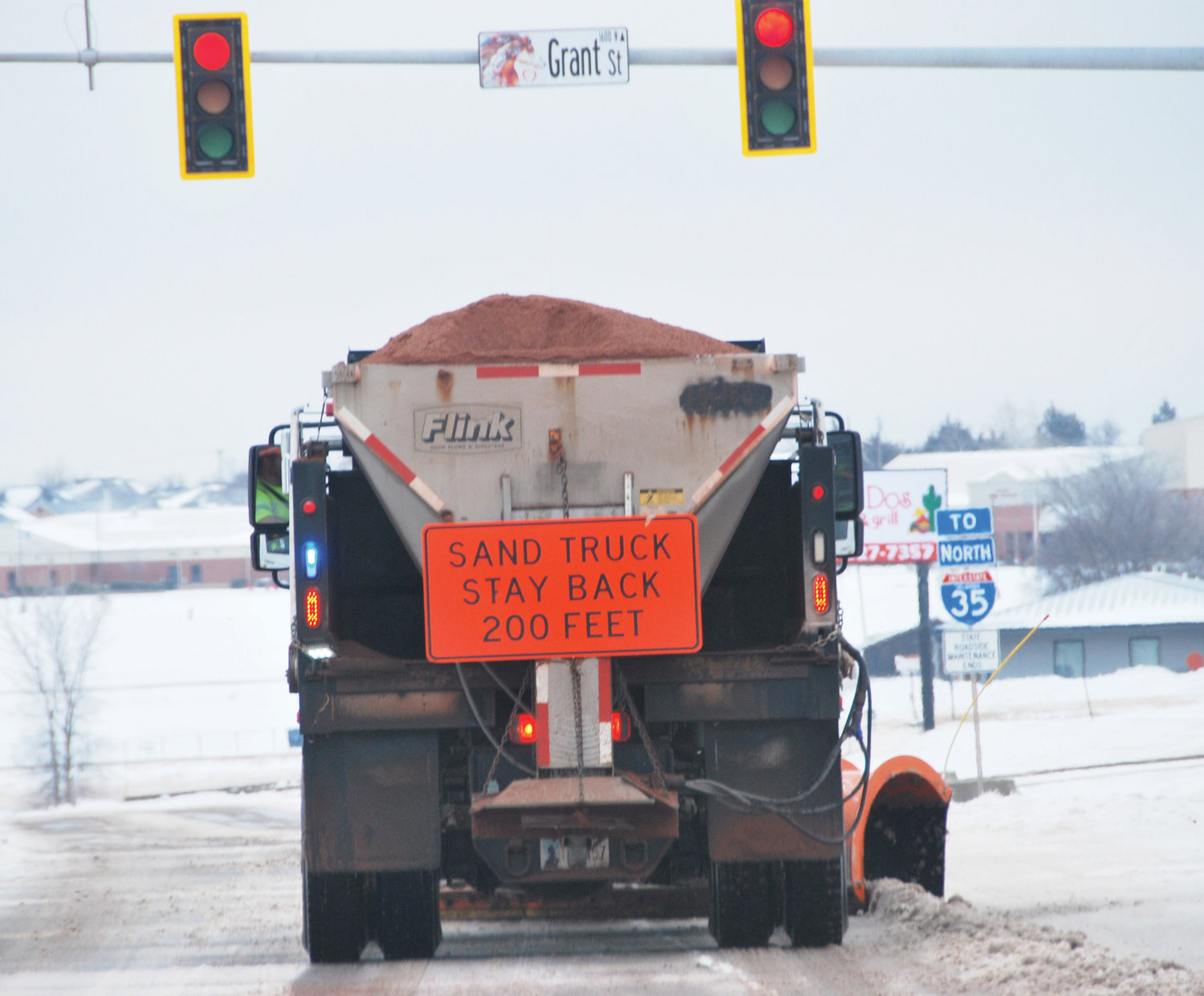After ODOT vehicles plowed the ice after last Wednesday and Thursday’s ice storm they also threw sand on the road to give vehicles better traction.
