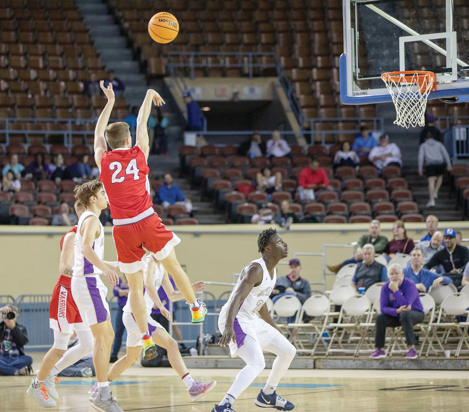 Washington junior Hayden Hicks puts up a jump shot against CCS in the State tournament at State Fair Arena. The Warriors fell 53-49. Hicks scored a team-high 14 points.