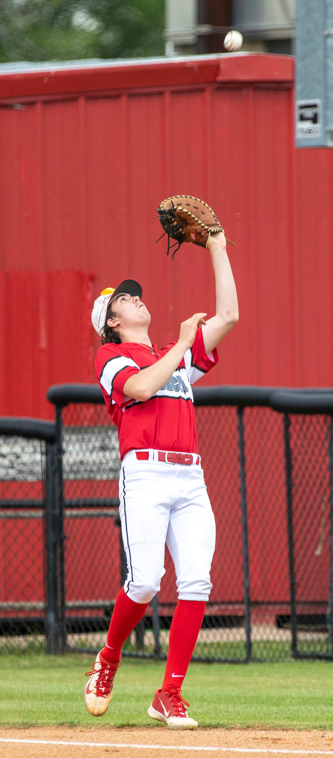 Purcell freshman Tucker Bloodworth settles under a foul ball during Purcell’s 4-3 District tournament win over Luther.