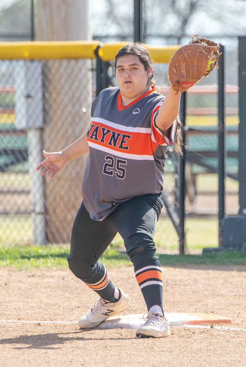 Wayne senior first baseman Mayce Trejo collects the ball for another out for the Bulldogs. Wayne was defeated 10-2 Tuesday in the State tournament by Tushka, ending their season.