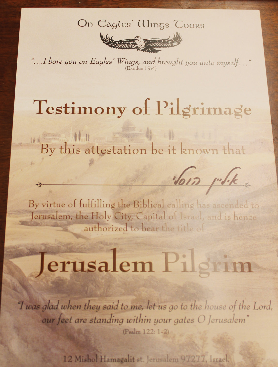 At the end of her visit to Israel, Elaine Howsley was certified a Jerusalem pilgrim. The certificate bears her name in Hebrew.