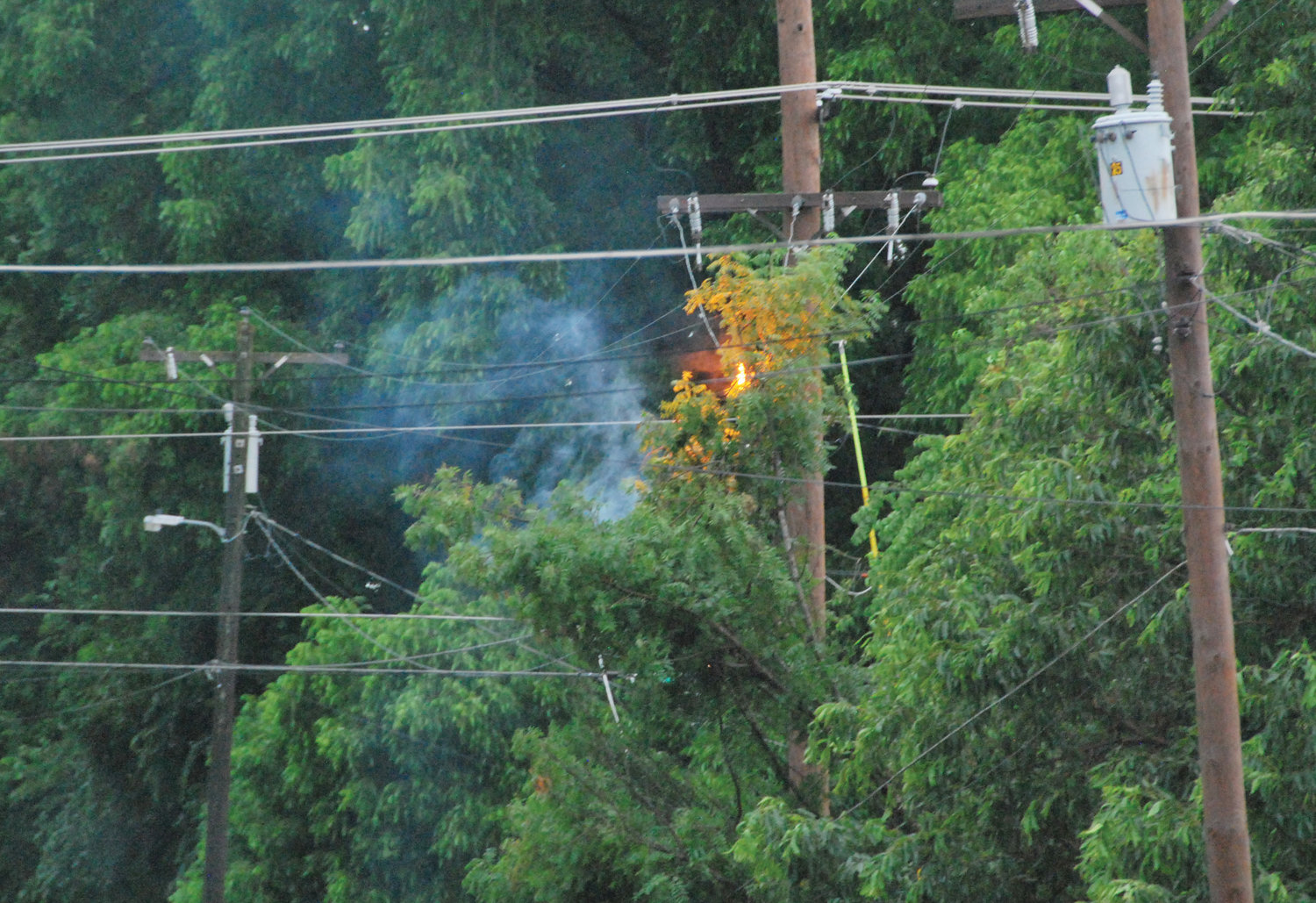 Following the intense storm that blew through Purcell early Tuesday morning a tree caught on fire from electric lines at Second and Huron.