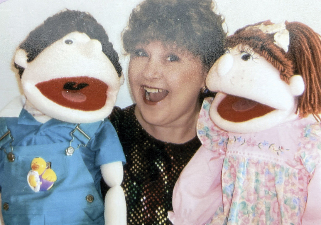 Tenna Garrett is a trained ventriloquist. Here she is with Spud, left, and Spudette.