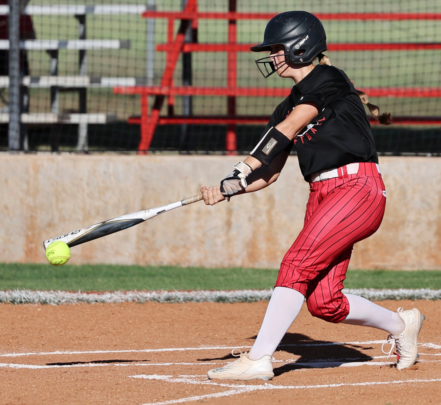 Purcell senior KK Eck puts the bat on a pitch during a 17-1 Dragon win over Meeker.
