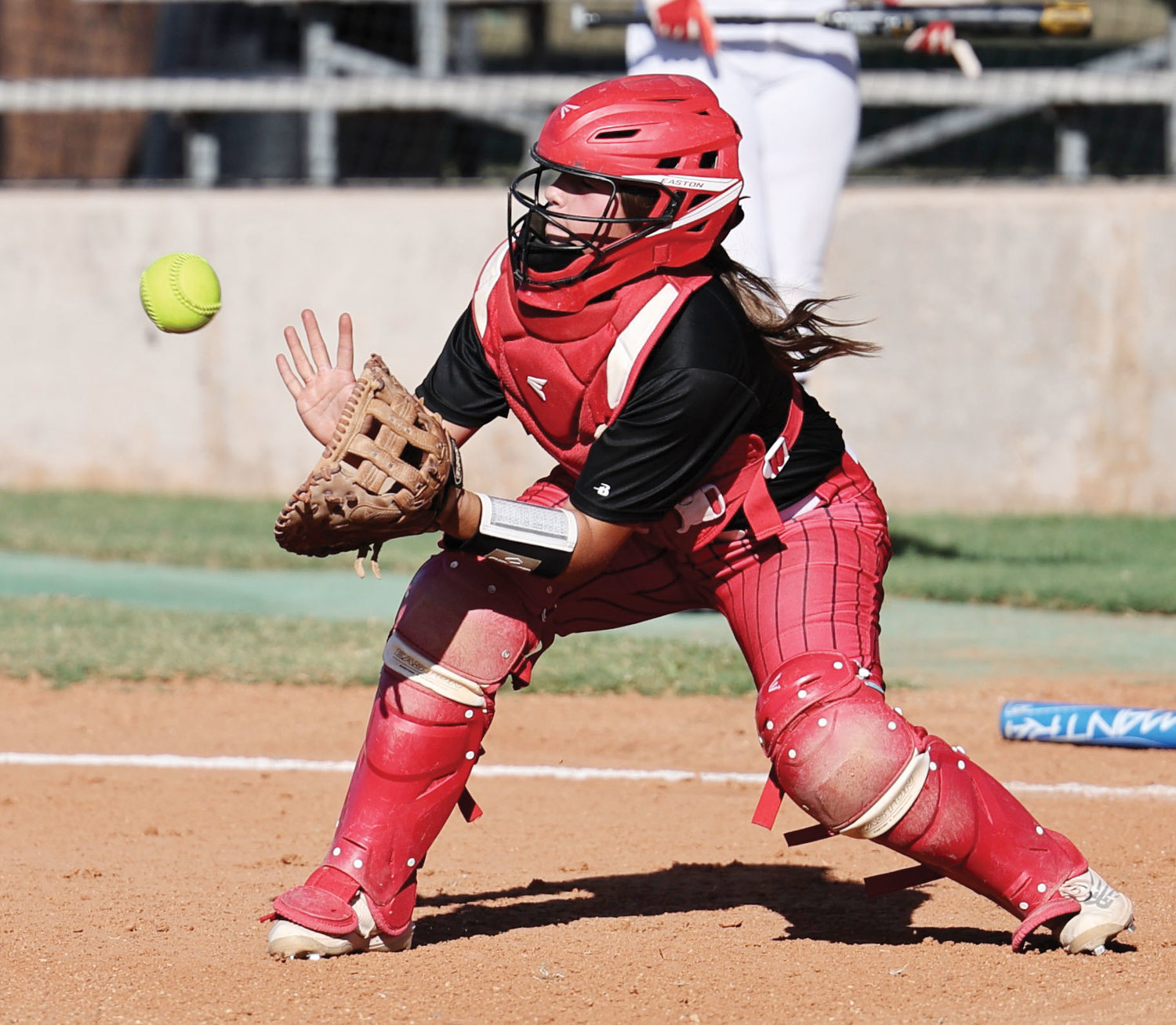 Purcell freshman MacKenzie McKay catches the ball at the plate during Purcell’s 17-1 win over Meeker.