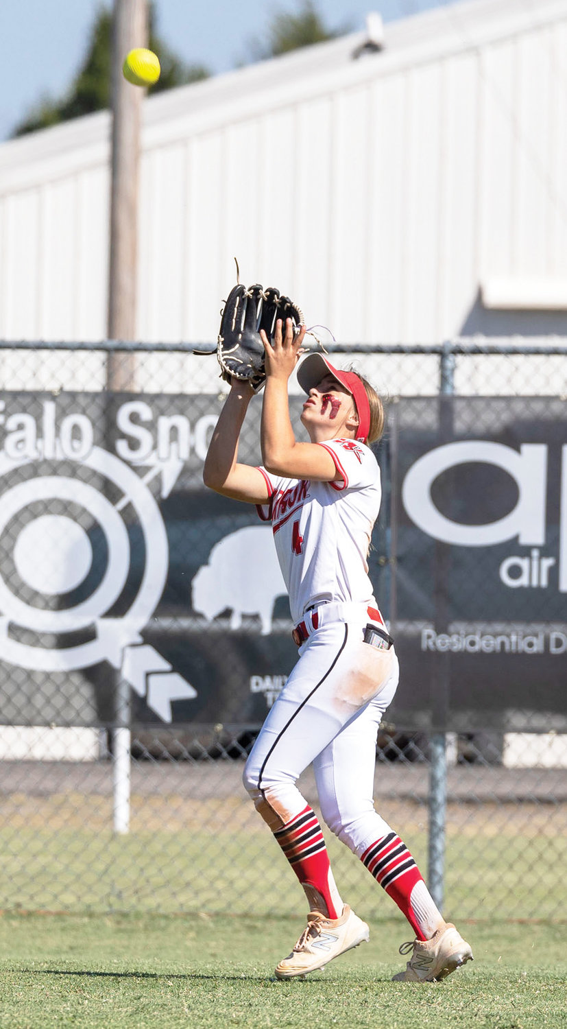 Washington senior Abby Wood settles under a fly ball during the Warriors’ 3-0 win over Purcell in the Regional tournament. The Warriors punched their ticket to the State tournament where they play Morris today (Thursday) at Hall Of Fame Stadium at 11 a.m.