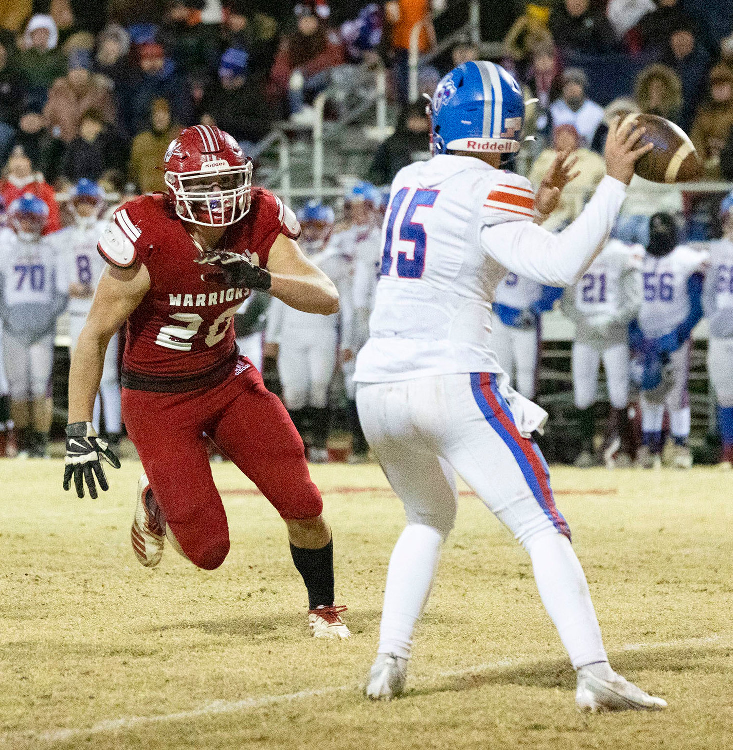 Washington senior Hayden Milner pressures the Oklahoma Christian School quarterback last Friday night during the Warriors’ 18-11 win. Washington travels to McAlester this Friday for a quarterfinal showdown against Idabel at 7 p.m.