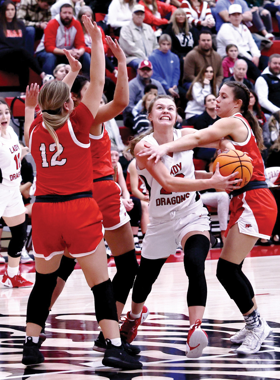 Purcell sophomore Hadleigh Harp fights to the basket against Washington. Purcell fell 59-54. Harp had six points in the game.