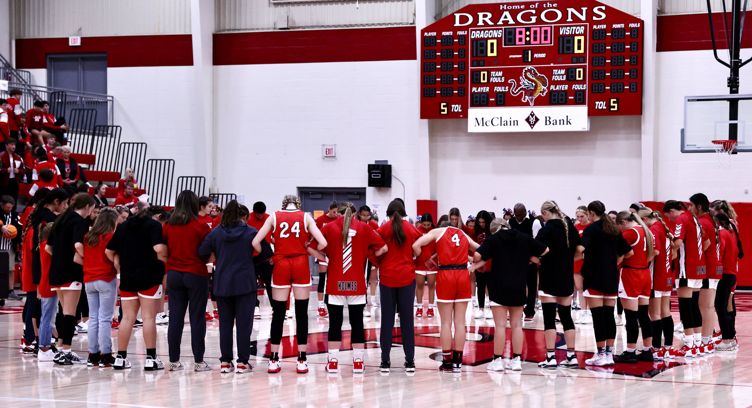 Both the Purcell and Washington girls basketball teams gathered at midcourt before their game November 29 for a moment of silence to honor Kendra Kilpatrick, a Stillwater High School math teacher and girls basketball coach. Kilpatrick had died of cancer days prior to the game.