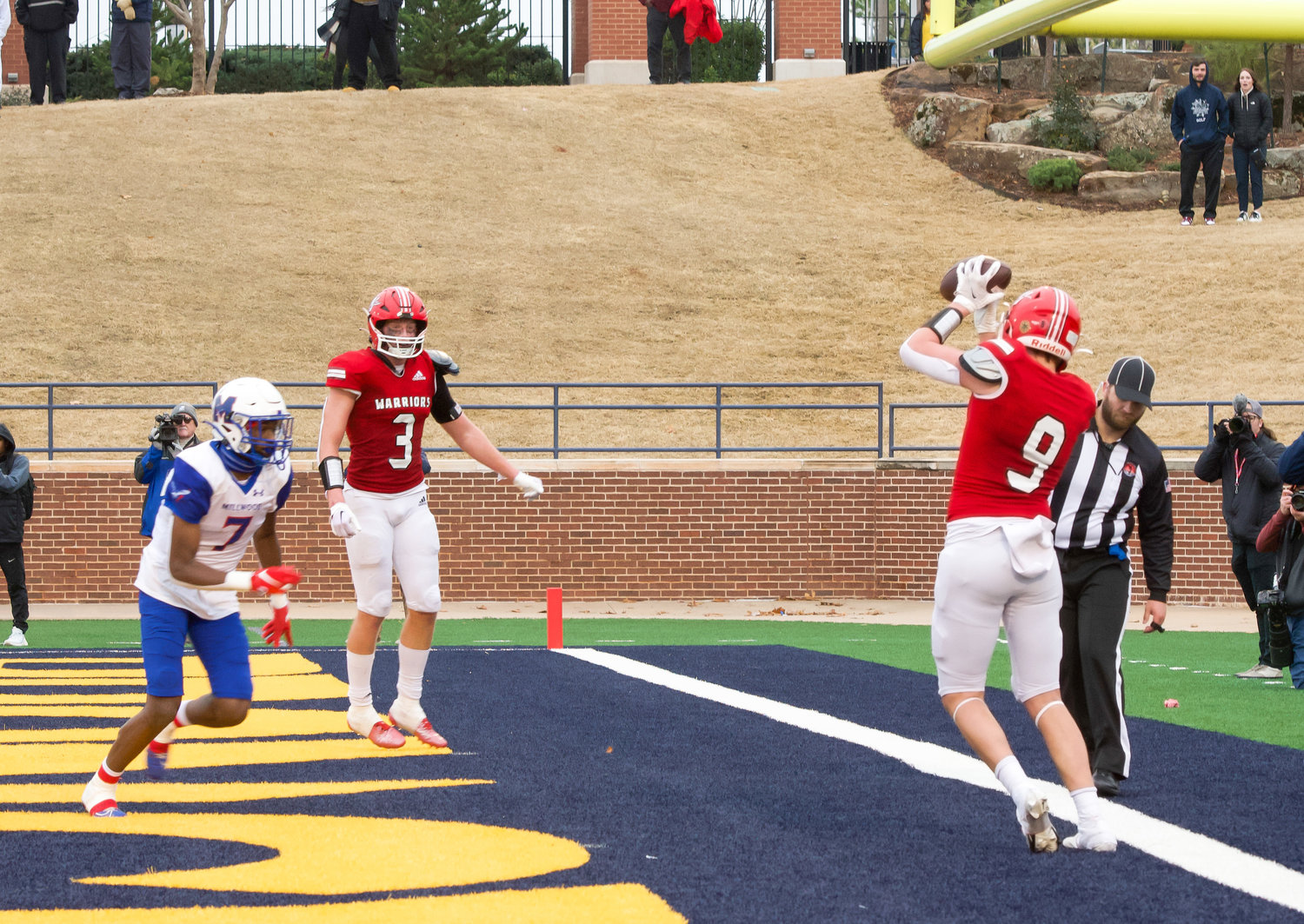 Washington sophomore Nate Roberts (9) catches the game-clinching touchdown from quarterback Major Cantrell during the Warriors’ 17-14 State championship win over Millwood on Saturday afternoon.