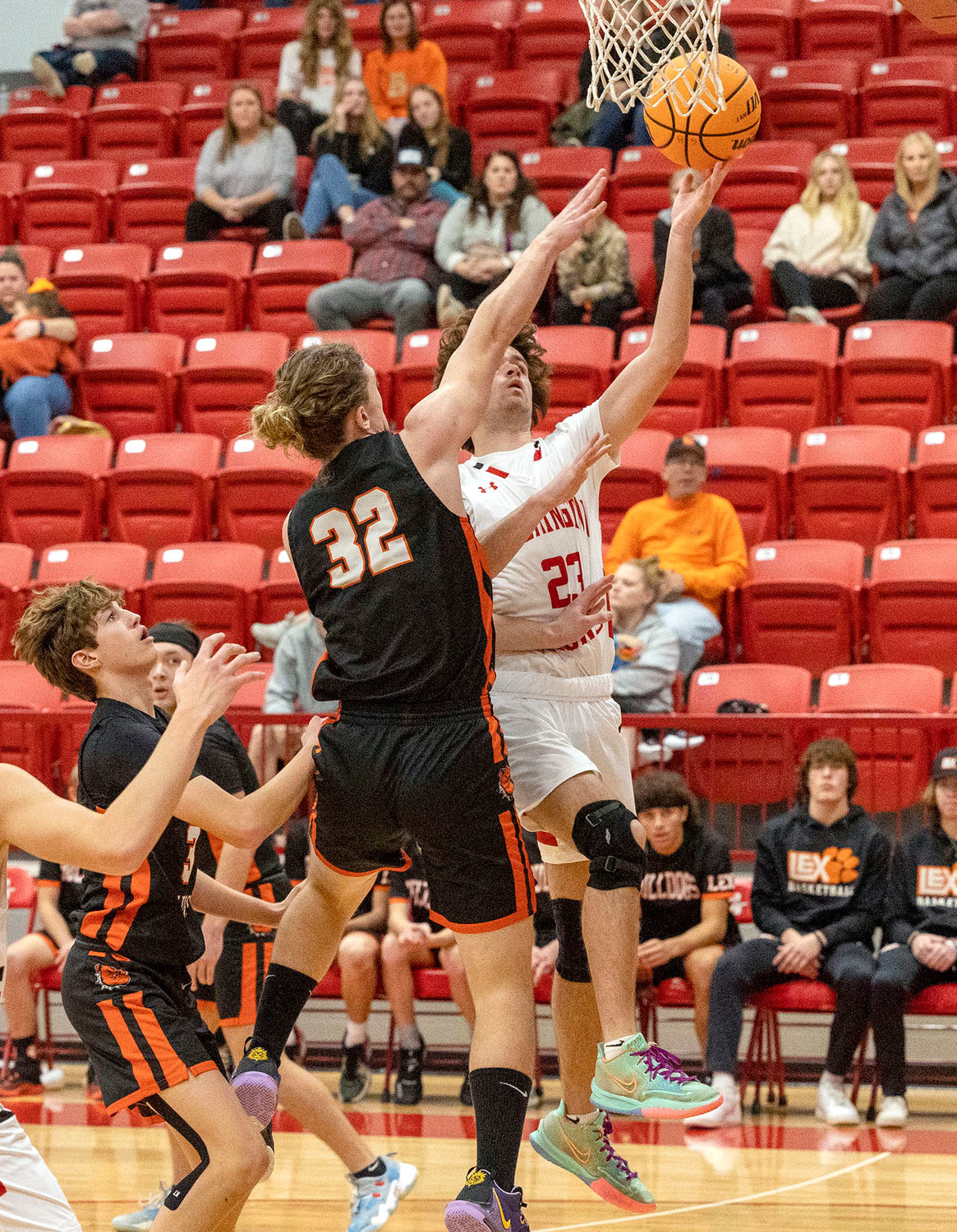 Washington senior Cash Andrews scores two of his game-high 23 points during the Warriors’ 87-31 win over Lexington. Washington plays again Jan. 3 against Pauls Valley at home.