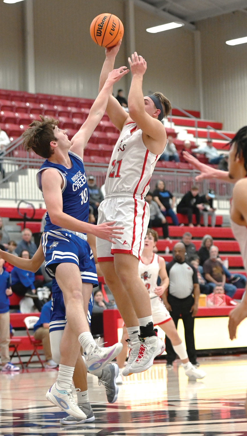 Purcell senior Hayden Ice goes to the basket during the Dragons’ 63-53 win over Bridge Creek. Ice scored 15 points in the game.