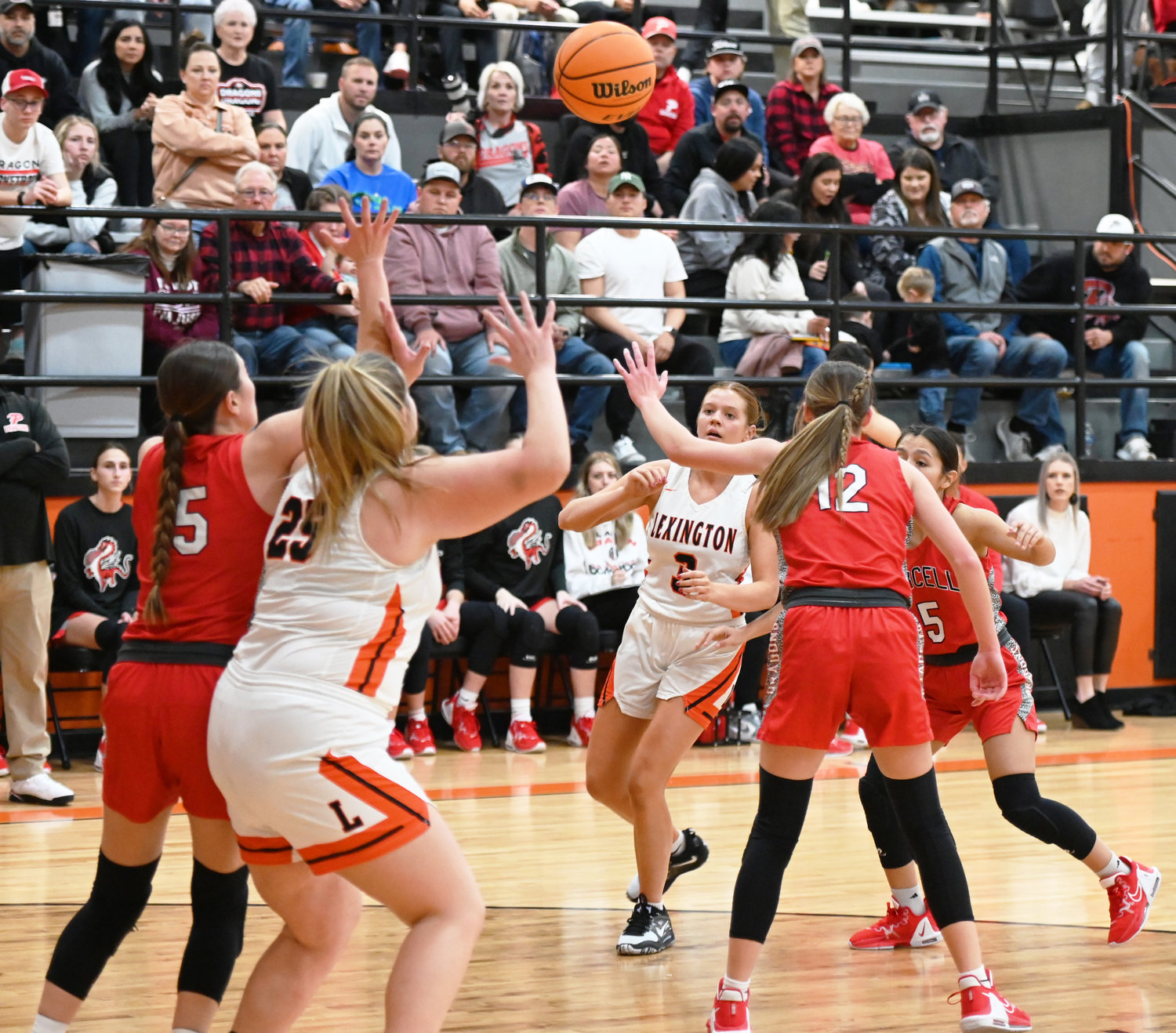 Rylee Beason tries to thread the ball inside to Maddie Manuel with Purcell’s Ella Resendiz defending. The Lady Bulldogs lost to Purcell last Friday, 61-40. Manuel had seven points.