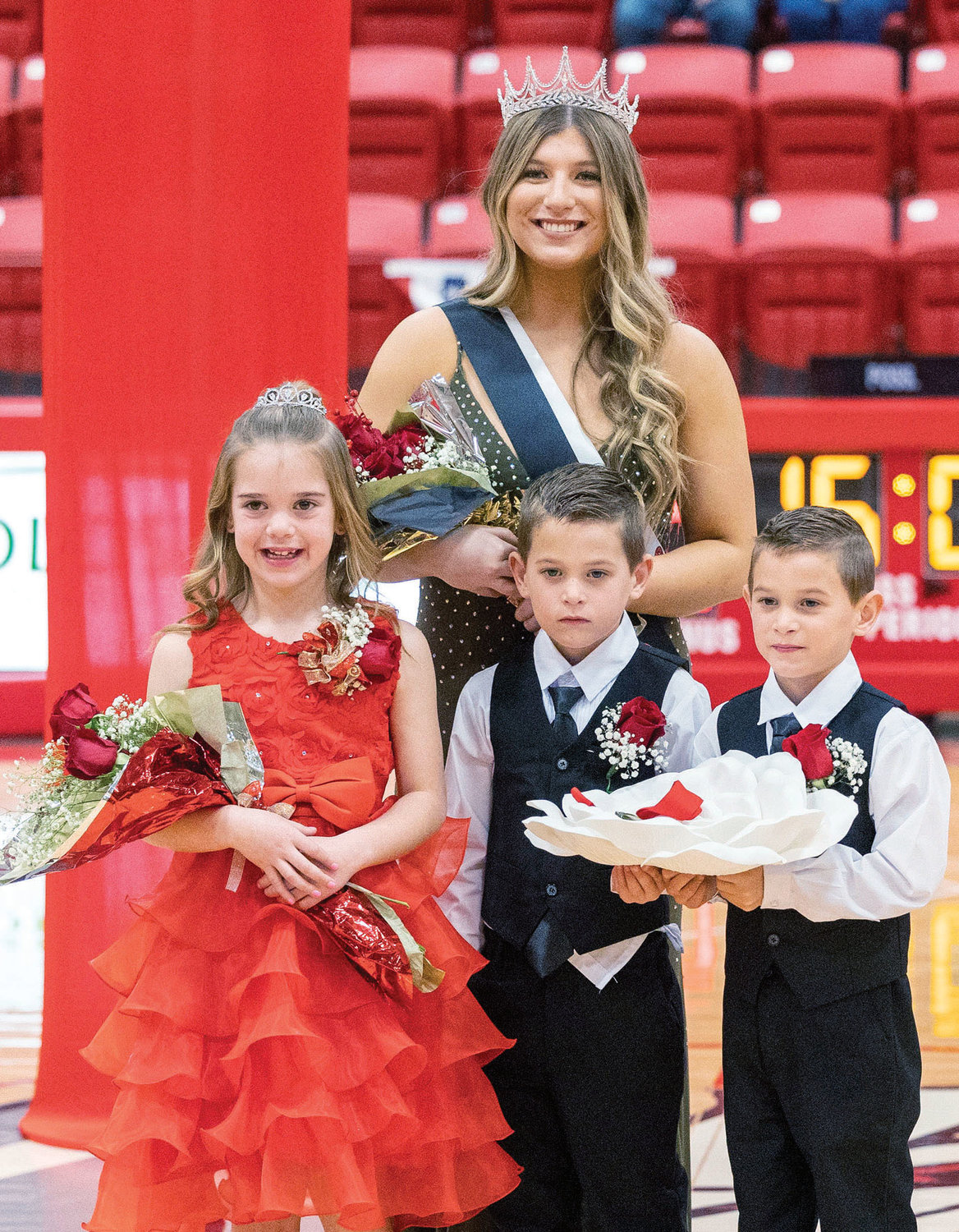 Washington senior Kyndall Wells was crowned queen Friday night during coronation at the Warrior Event Center. Krozlie Simon was the flower girl and Jett and Curry Tims were the crown bearers.
