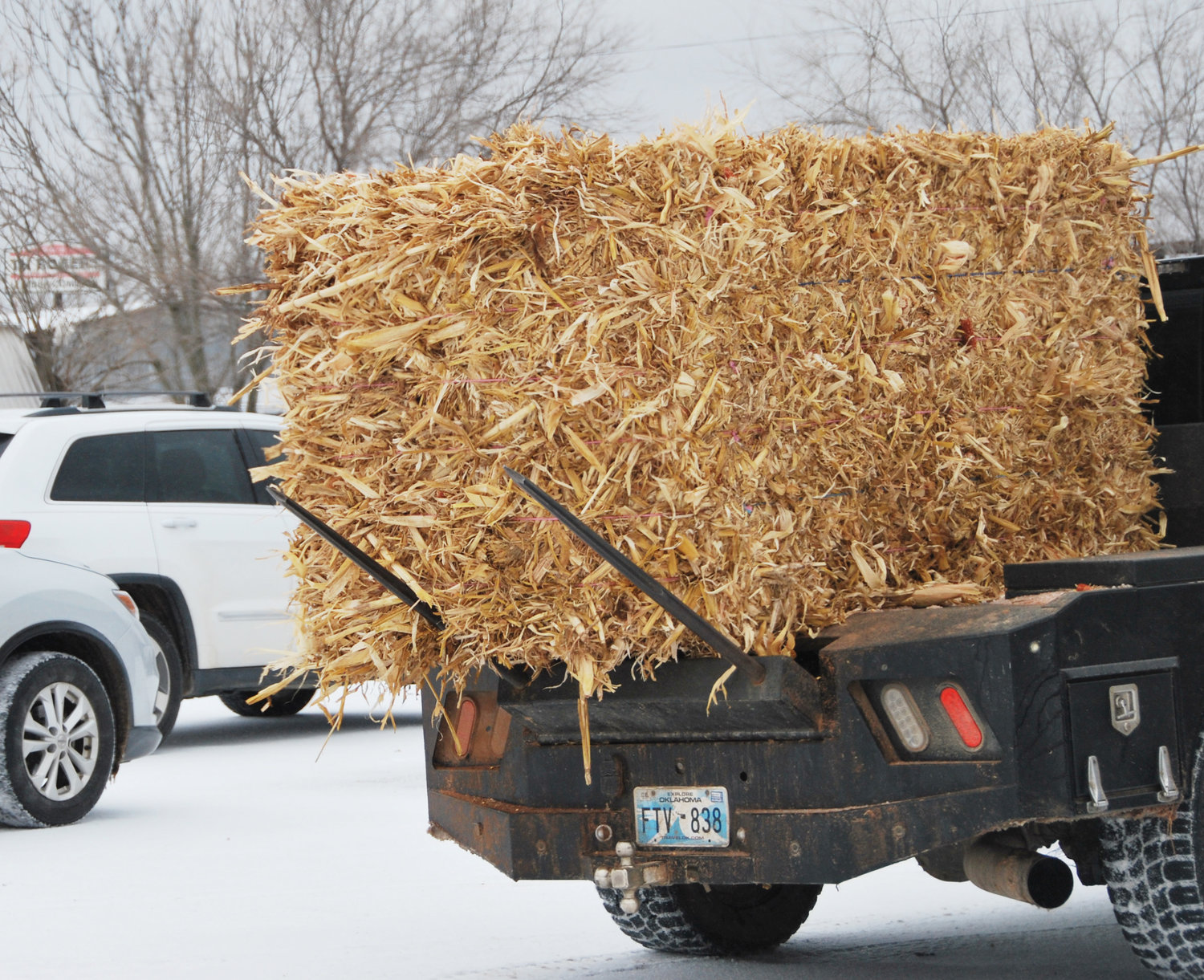 A big square bale of hay was put to good use by this truck during Monday’s ice storm that blew through the state.
