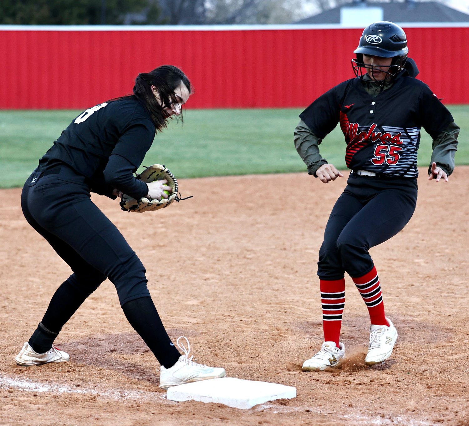 Purcell sophomore Hannah Whitaker gets an out at third base against Vanoss. The Dragons were defeated 15-5.
