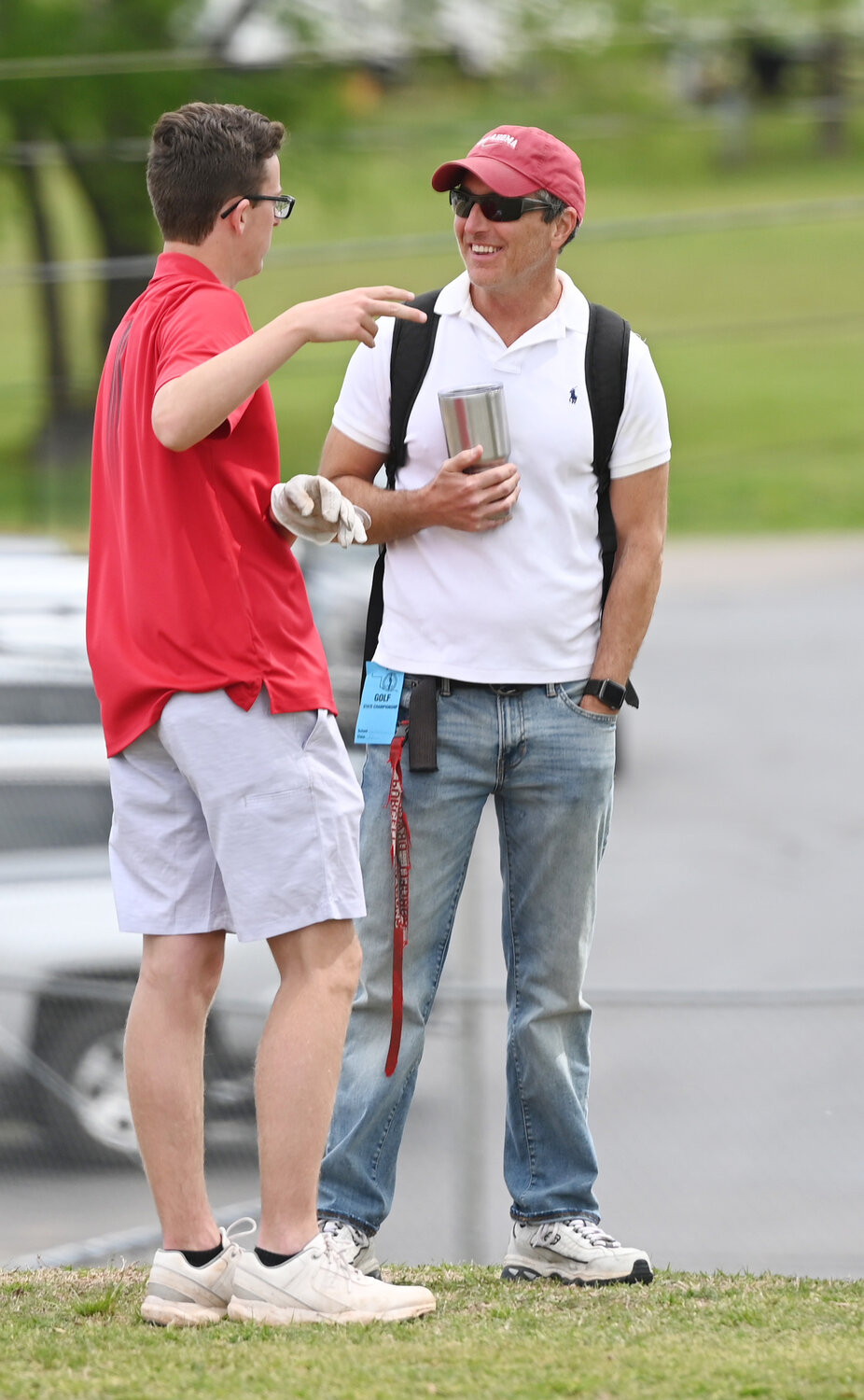 Purcell golfer Noah Gracey and Michael O’Neal talk on the No. 1 tee box Monday at Brent Bruehl Memorial Golf Course during the Regional tournament. Gracey shot 171 over 36 holes and qualified for the State tournament.