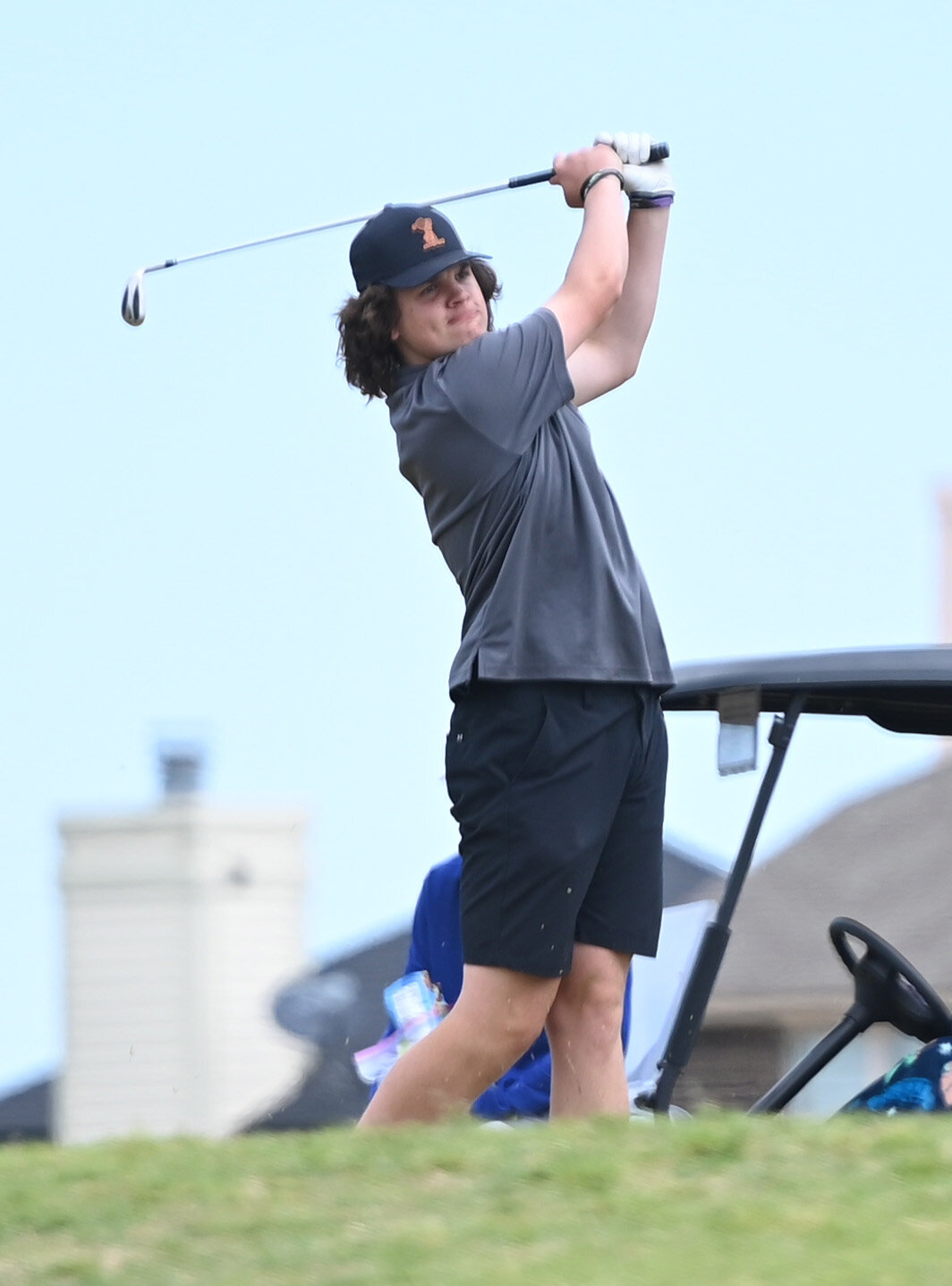 Washington golfer Logan Janaway watches his tee shot during the Regional golf tournament at Brent Bruehl Memorial Golf Course on Monday. Janaway shot 96-108 for a two-round total of 204.