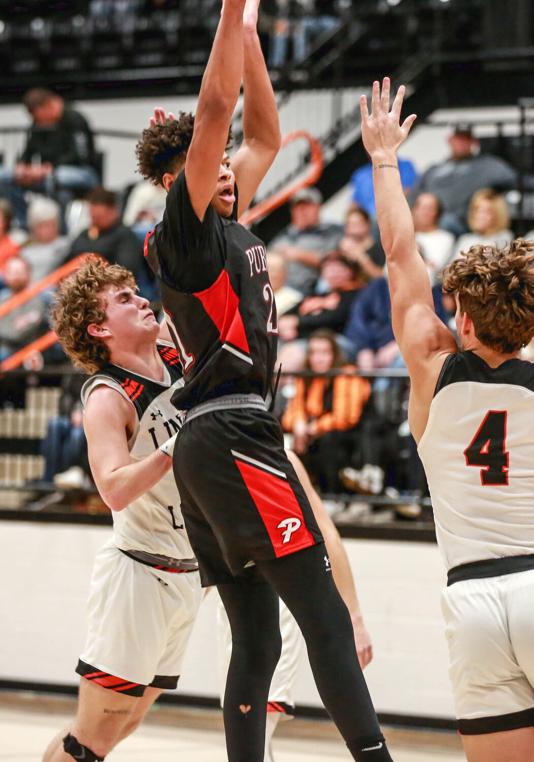 Purcell senior Kylen DeFreeze shoots over the top of the Lindsay offense last Friday. Purcell was defeated 42-41. DeFreeze had a team-high 13 points in the game.