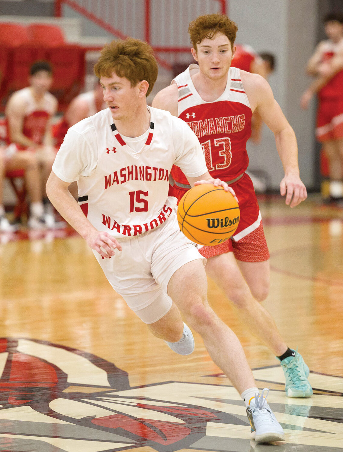 Washington senior Noah Ladlee dribbles in front of the defense during the Warriors’ 54-22 win over Comanche Saturday. Ladlee scored seven points in the game.