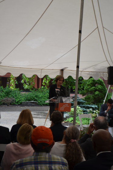 TCFD President Dr. Theresa Hamlin gives remarks on the hospital's aims and services.