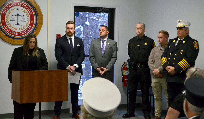 Sullivan County District Attorney Meagan Galligan, left, Sullivan County Chief Assistant District Attorney Brian Conaty, New York State Senator Mike Martucci, Sullivan County Sheriff Mike Schiff, legislative aid to Assemblywoman Aileen Gunther Matthew McPhillips and Sullivan County Fire Coordinator John Hauschild making remarks to support "Billy's Law" following the sentencing of Mohammed Islam for a fire at which Forestburgh fire department asistant chief Billy Steinberg died.