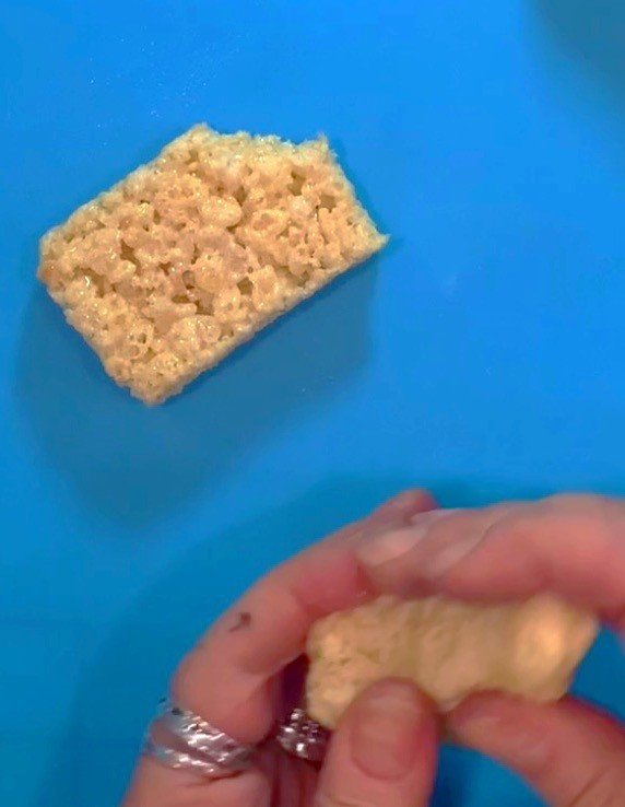 Shape the body, head and hat out of Rice Krispie treats.