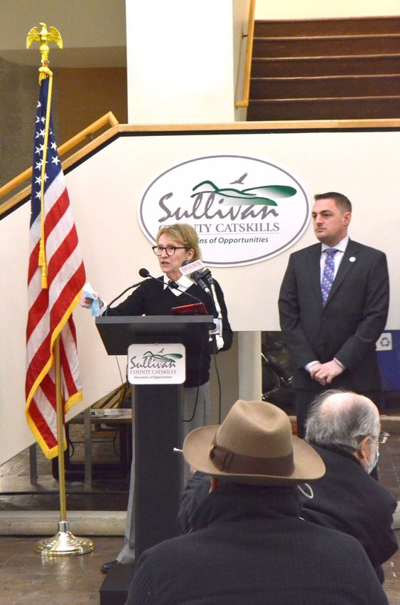 Assemblywoman Aileen Gunther, at podium, joined by Senator Mike Martucci, speak at a press conference on February 8, held to advocate for the Department of Health regional office to stay in Monticello.