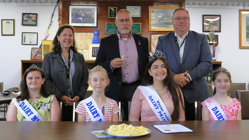Wayne County Dairy Princess Electra Kahagias and her Court pose with the Wayne County Commissioners; commissioner Joseph Adams, standing right, won election to the Pennsylvania State House in 2022's elections.