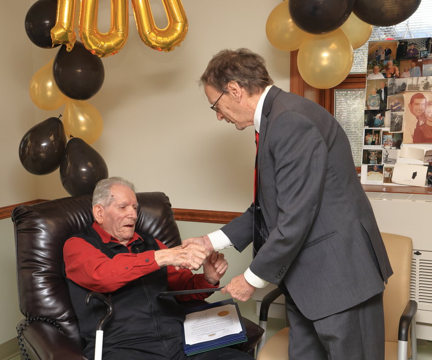 Hawley mayor John Nichols congratulates Raymond “Ray” Naholnik on the occasion of his 100th birthday, and presents him with a proclamation naming February 1, 2023 as Raymond Naholnik Day in the Town of Hawley...