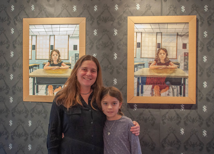 One of Robyn Almquist's paintings hanging at the DVAA is a thought-provoking series featuring her daughter, nine-year-old Amelia.