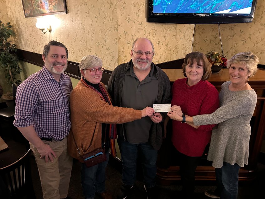 With the help of Honesdale Rotary, the WCAA was able to buy a building on Main Street. Pictured are Stephen Moulton, left; Janet Gaglione; Dave Harvey; Sherry Grandinetti; and Bonny Cousins...