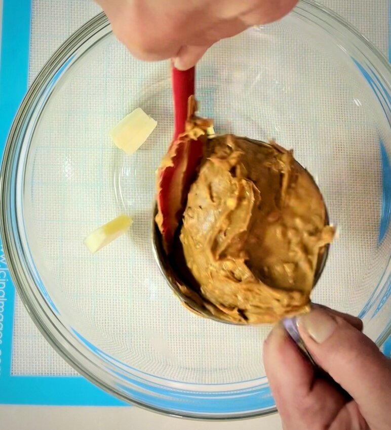 Make the peanut butter filling: Place butter into a bowl. Stir in the peanut butter and the salt. Mix well. Add the confectioners sugar and mix. Add water and mix until totally combined...