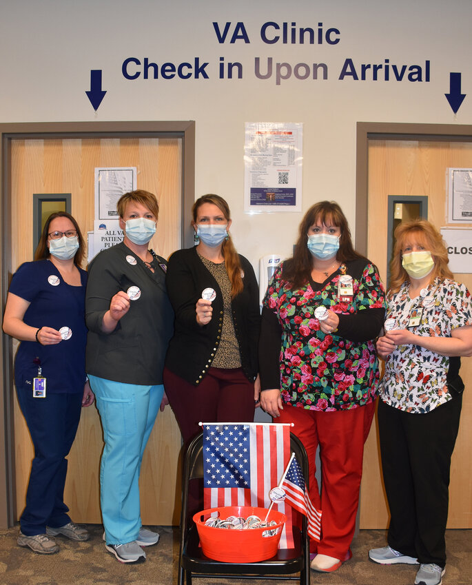 Staff of the Honesdale VA Outpatient Clinic hold up their Moment of Remembrance campaign buttons. Pictured are Tracy Robinson, left; Jolene Pryzant; Jessica Woodmansee; Rheanon Weston; and Tina Taylor...