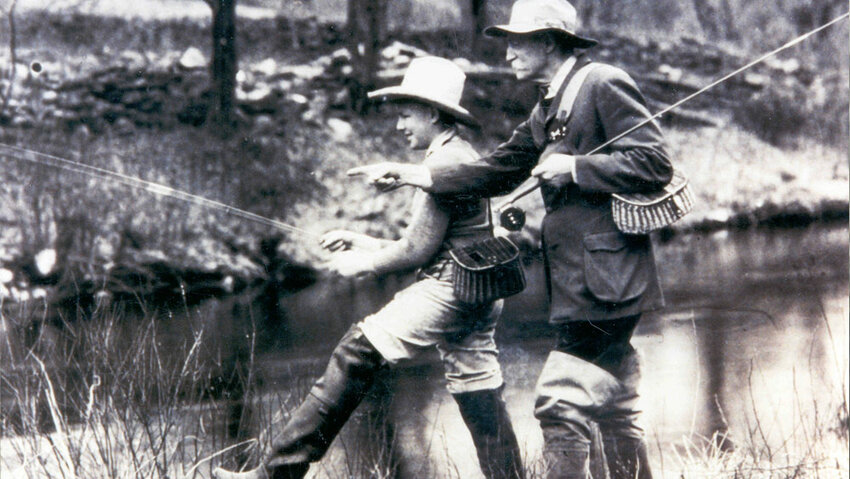 Gifford Pinchot and his son, fishing around 1930.