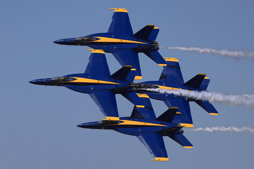 The U.S. Navy’s Blue Angels make a pass in tight formation—about two feet apart—in front of the grandstand at the 2023 Great Pocono Raceway Airshow...