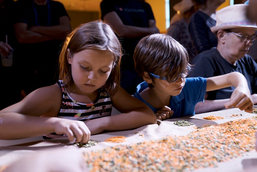Creating with lentils at a past Deep Water Literary Festival.