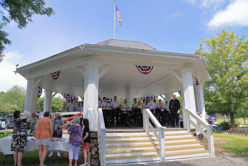 The newly named and refurbished Ellingsen Bandstand in Hawley’s Bingham Park is pictured on July 29 at the ribbon cutting ceremony with the 23-piece Ringgold Band on the deck at the end of the performance.....