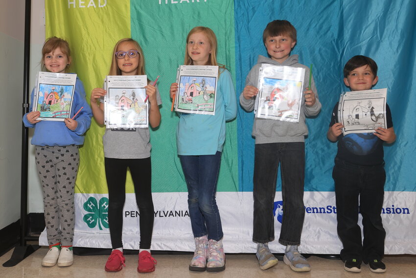 Honoring the participants in the 4-H coloring contest. Pictured are Cally Non, left; Alexandra Lopatofsky; Gwendolyn Schuman; Cody Weist; and Finnian Loughran.