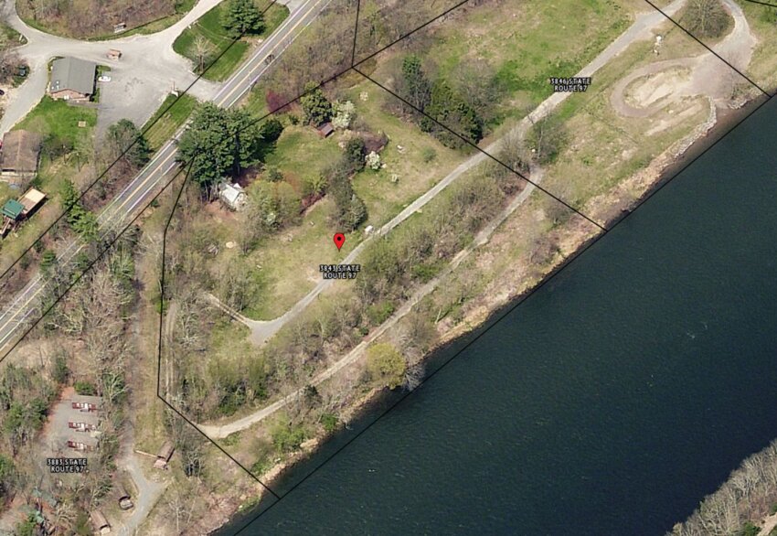 This aerial from 2020 shows the five-acre riverfront plot before the park models were added.